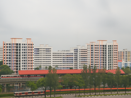 HDB housing estate in Teck Whye, Singapore, surrounded by greenery and wide roads
