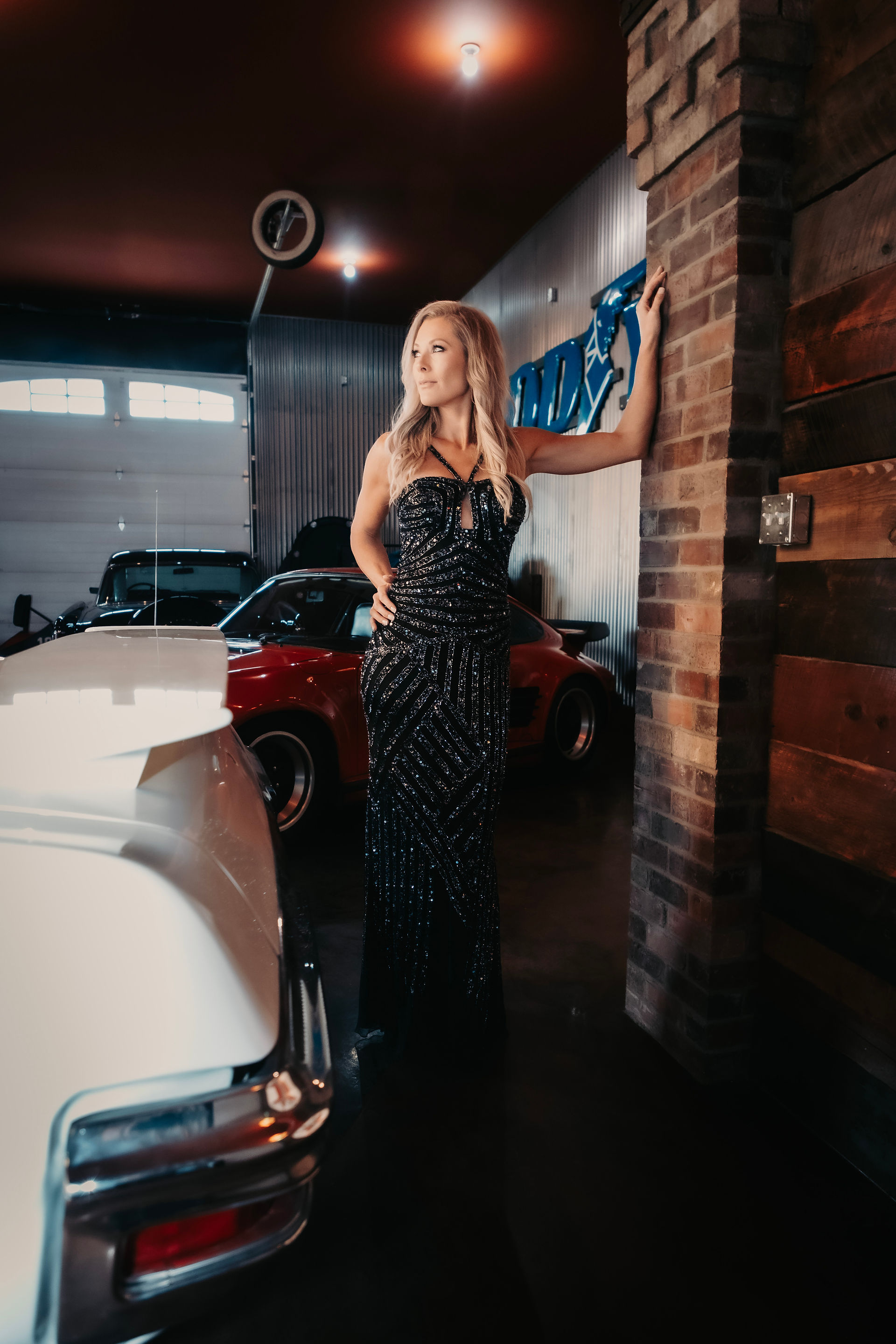Elite Tees models showcasing the amazing vintage cars at our Gasoline Alley venue.