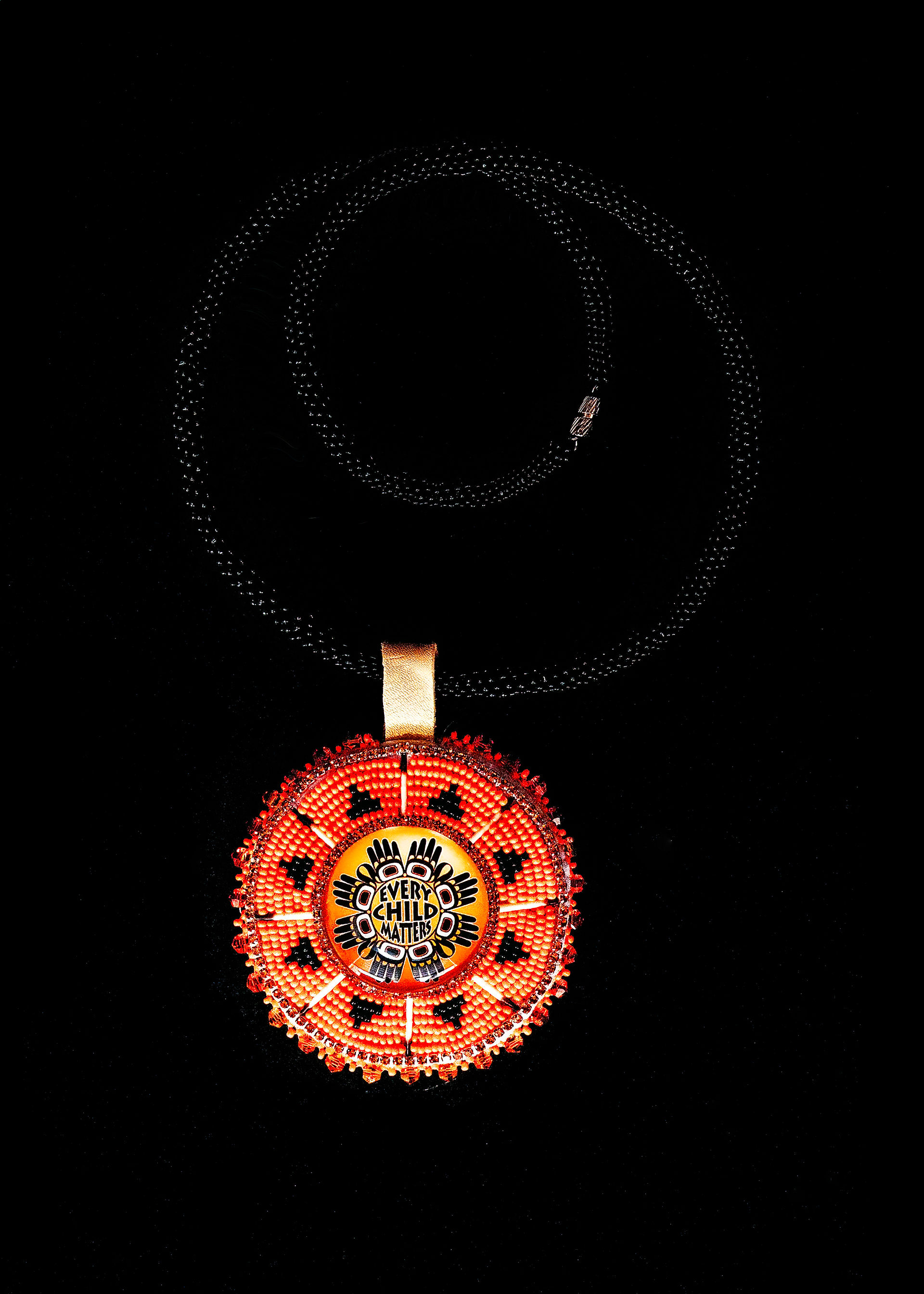 Dorienne Proulx, an Anishinaabe-Cree Métis woman and of Little Star Artistry handcrafted beadwork.