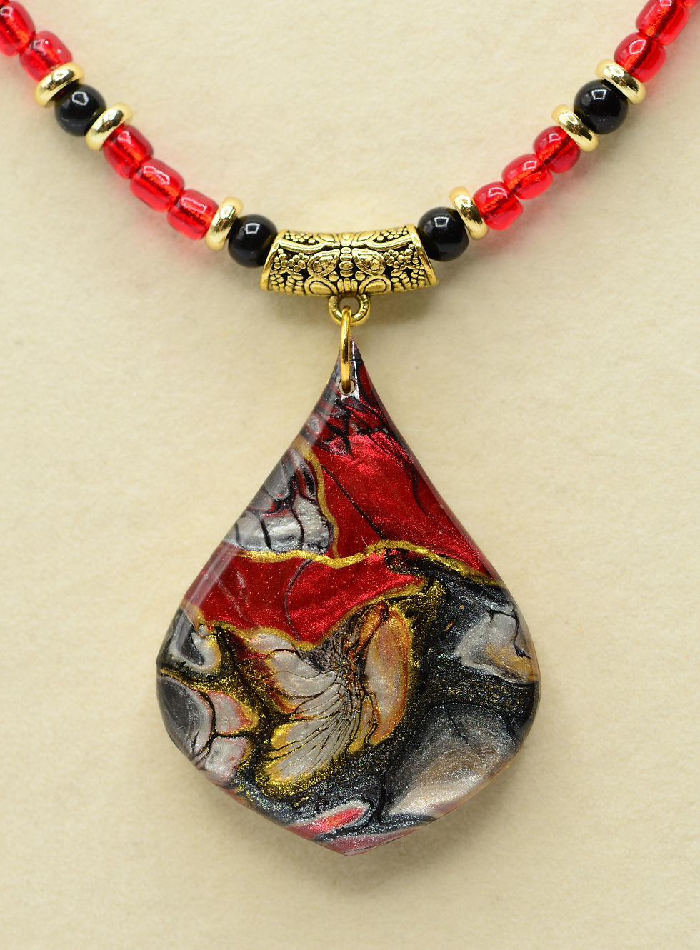 Thumbnail: Fluid Art Pendant on Beaded Necklace
