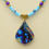 Thumbnail: Fluid Art Pendant on Beaded Necklace