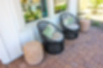 vecteezy_front-pavers-patio-with-two-rattan-chairs-with-cushions_13959497.jpg
