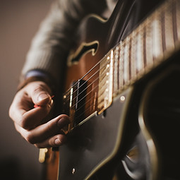 playing a guitar