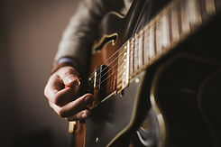 playing a guitar