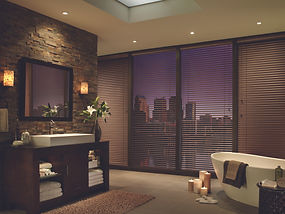 Modern precious metal blinds in an ensuite.