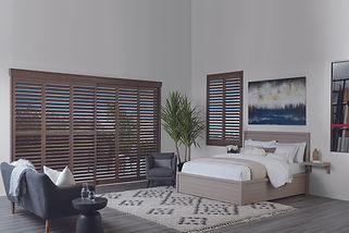 Hunter Douglas newstyle, hybrid shutters in the bedroom.