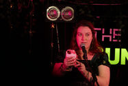 Photo of StoryTree Issue 3 Contributor Emily Christie performing.