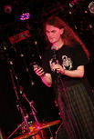 Photo of StoryTree Issue 3 Contributor Ashley Bell performing.