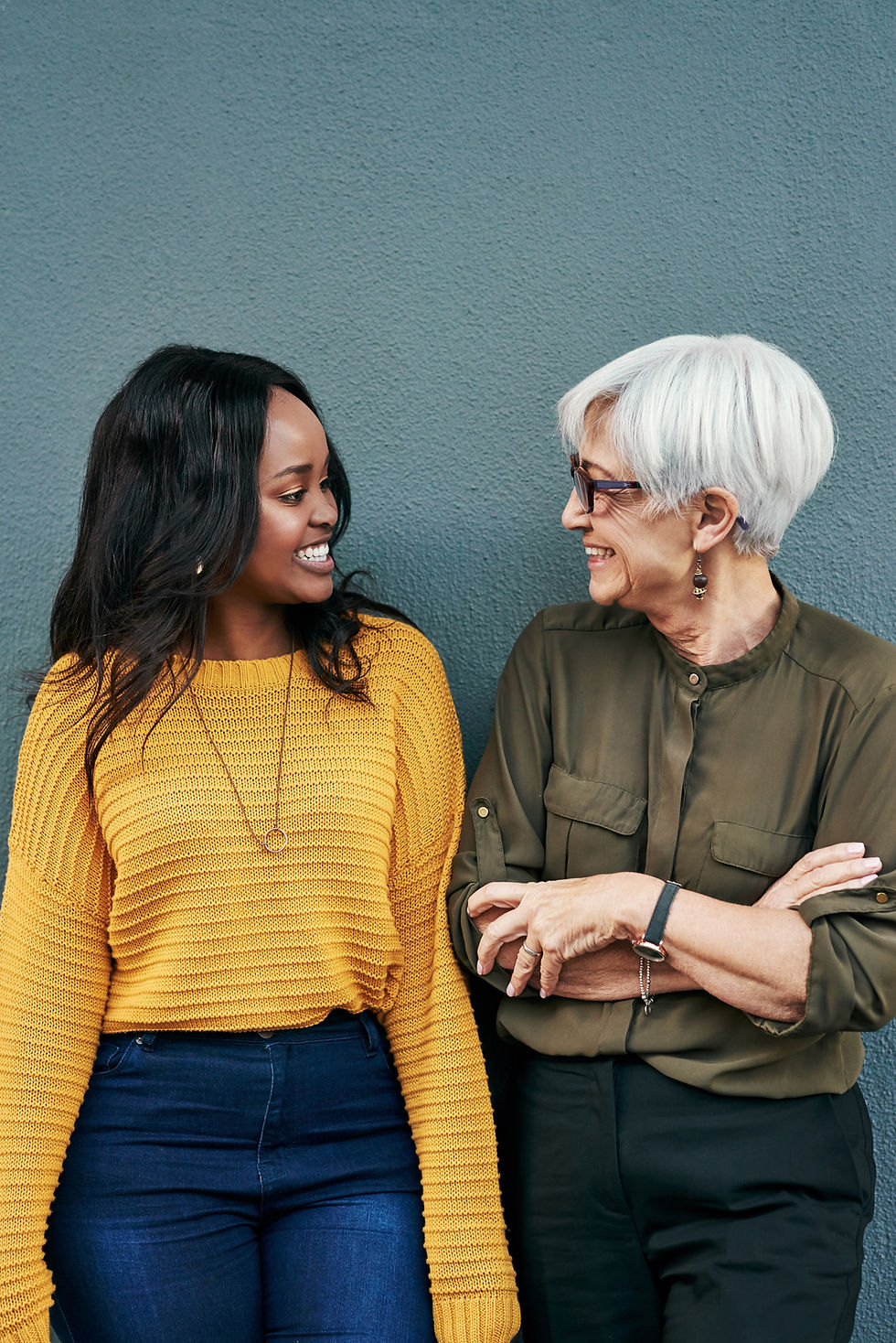 Black woman, senior businesswoman and talking on break or conversation with employee, frie