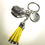 Thumbnail: Keyring Never give up Bottle Yellow Tassel