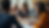 Eye-level view of a diverse group of community members engaged in a discussion