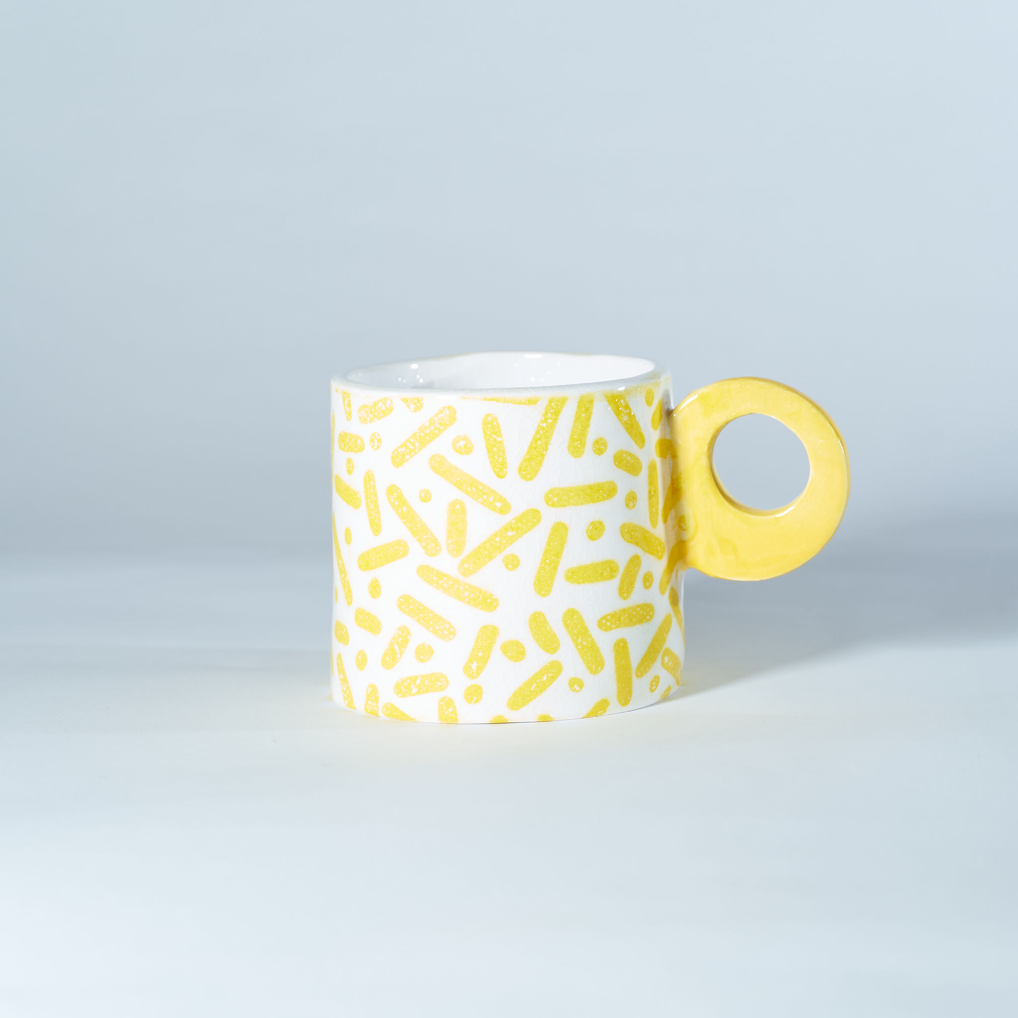 Pocillo amarillo rayas