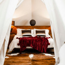 Luxury tipi glamping bedroom