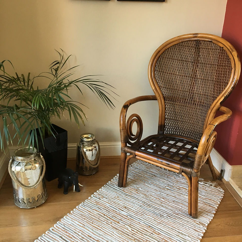 Thumbnail: Chindi leather rag rug on floor in front of peacock chair