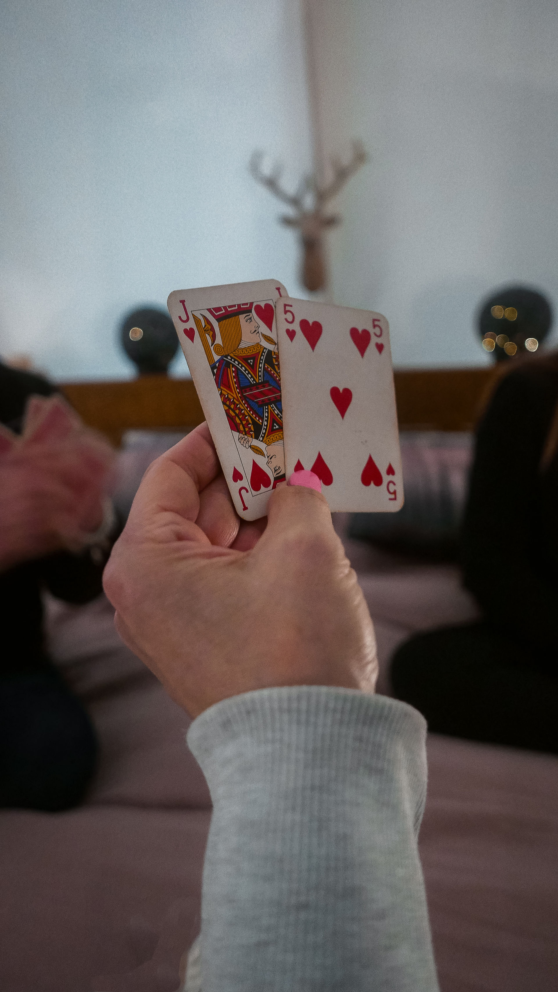 lady with cards in hand