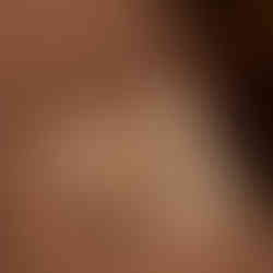 book on bed in glamping tipi master bedroom