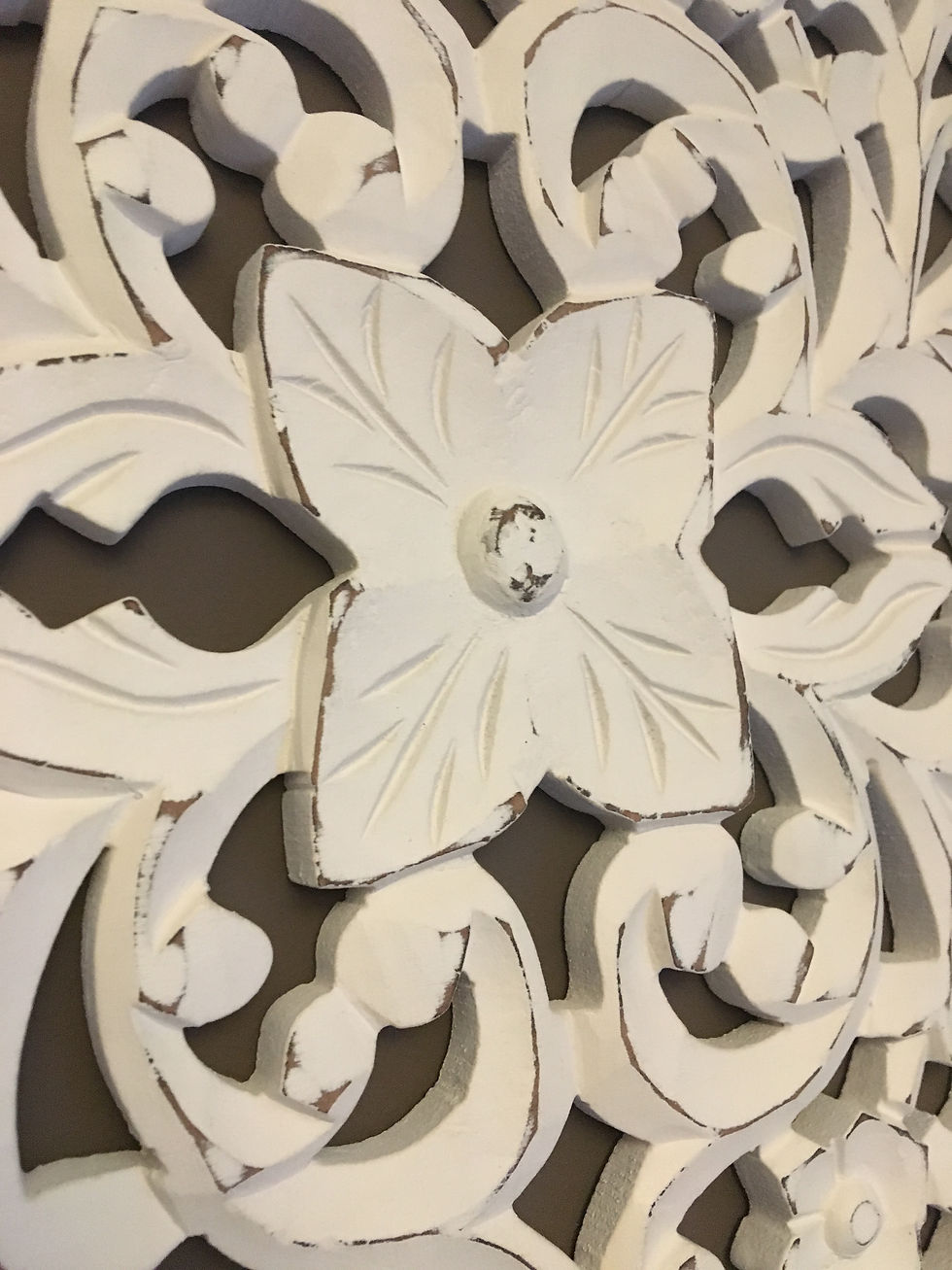 Thumbnail: Close up of Floral Carving on White Wood Panel
