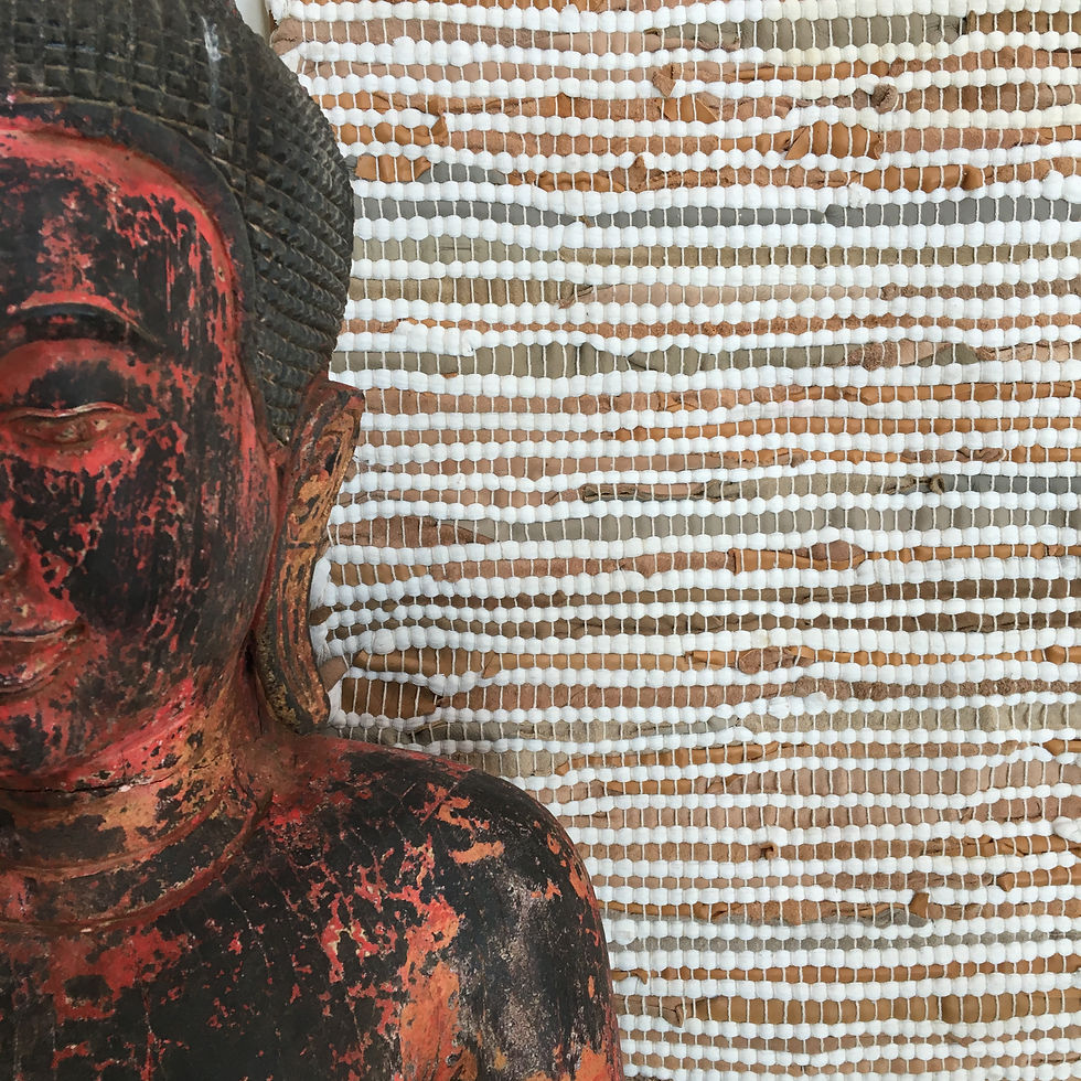 Thumbnail: Close up of buddha and Chindi leather rag rug