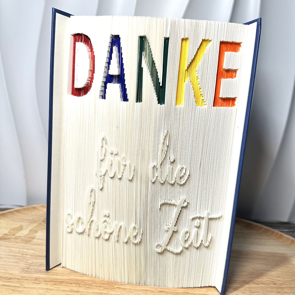 Emotionales Geschenk zum Schulabschluss für Lehrer und Pädagogen – gefaltetes Buchkunstwerk mit bunten Highlights und Danke-D