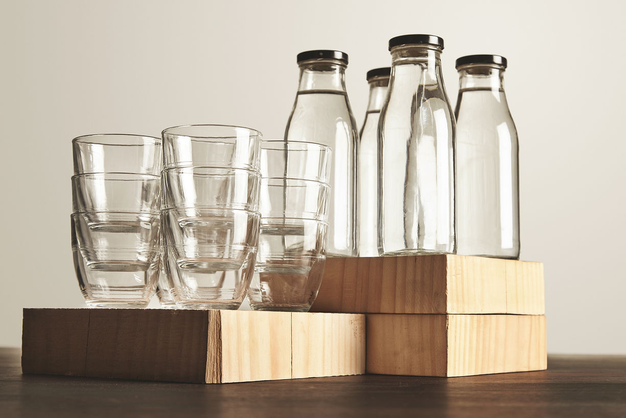 perfect-set-pure-clean-healthy-water-transparent-glass-bottles-cups-presented-wooden.jpg