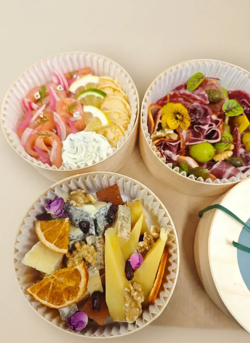 Food boxed trays: salmon & blinis, charcuterie, and cheese