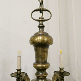 A large Edwardian antique bronze chandelier with six arms attributed to Faraday & Son
