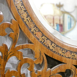an early 20th century Italian antique fretted walnut fold out dressing table mirror with oval mirrors and marquetry design