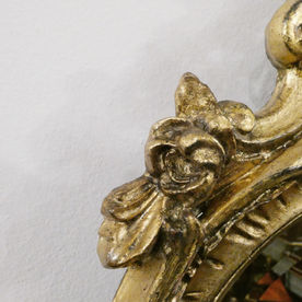 Pair of French giltwood and gesso antique wall mirrors in the Rococo style