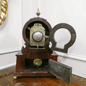 A Georgian rosewood antique bracket clock by William Turner of London with Egyptian design influences in the style of Thomas Hope. The eight day twin fusee movement strikes the hours on a bell