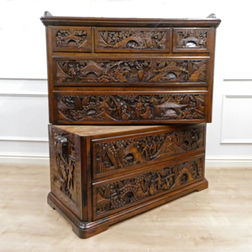 early 20th century Oriental camphor wood campaign chest of drawers profusely carved with seven drawers
