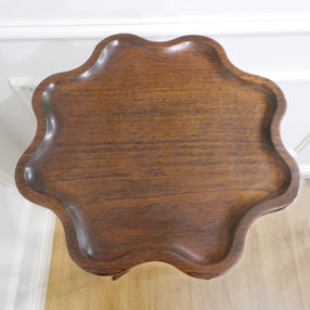 a pair of Edwardian oak antique torchere or plant stands on tripod bases with vase shaped central column