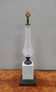 a pair of antique French style glass table lamps from the mid-century era with bronze and marble elements