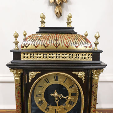 A French boulle antique mantel clock in the Louis XIV style with eight day movement striking on a gong