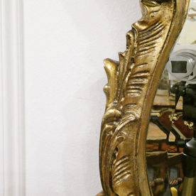 Pair of French giltwood and gesso antique wall mirrors in the Rococo style