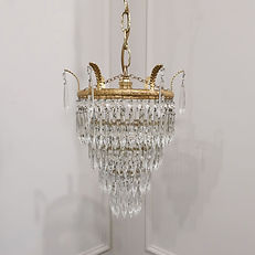 an antique Art Deco four tier crystal glass waterfall chandelier