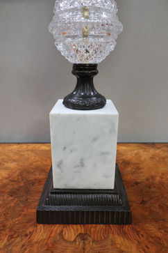 a pair of antique French style glass table lamps from the mid-century era with bronze and marble elements