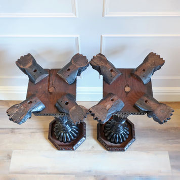 an antique pair of Georgian oak candle stands with baluster shaped columns, octagonal top and inlay  standing on paw feet