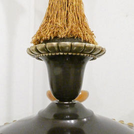 An Art Deco period bronze chandelier in the Empire Style with gilt bronze arms terminating to alabaster shades