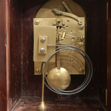 an antique German mahogany mantel clock with silvered dial by Winterhalder and Hofmeier ting tang gong striking movement which has slow fast mechanism 