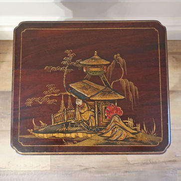 antique nest of three mahogany tables with chinoiserie gilt design standing on slender cabriole shaped legs