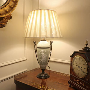 French 19th century pate sur pate table lamp in the Neoclassical style with green celadon porcelain body and bronze mounts