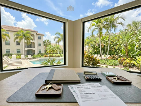Florida property tax update cover with homestead exemption documents, keys, and condo community view