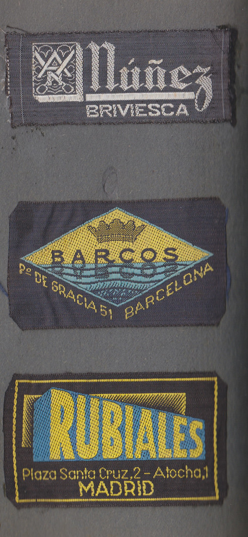 Vintage clothing labels are hidden in clothes.