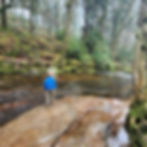 boy by river dart