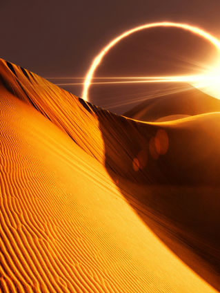 Solar eclipse taking place in the horizons of an undulating desert landscape.