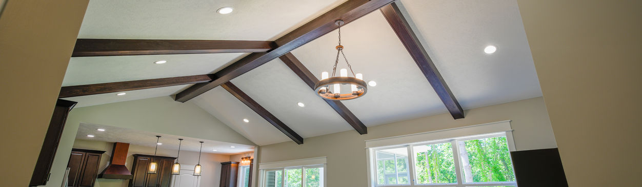 Living room interior with exposed beams.