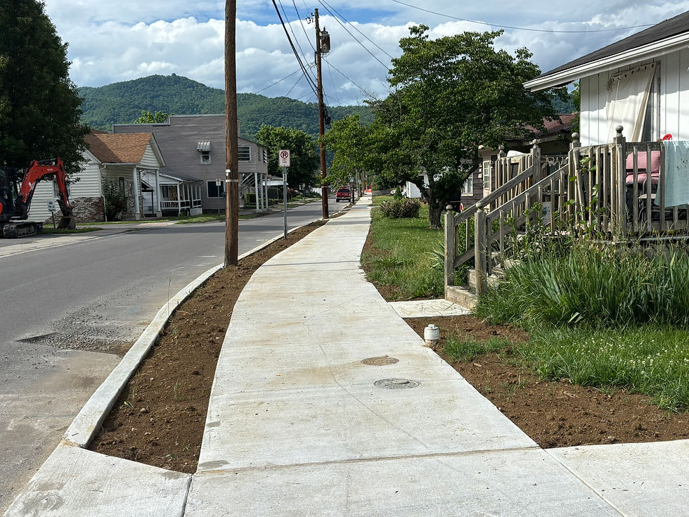 Sidewalk and curb replacement phase is underway along Pleasant Street in Avis