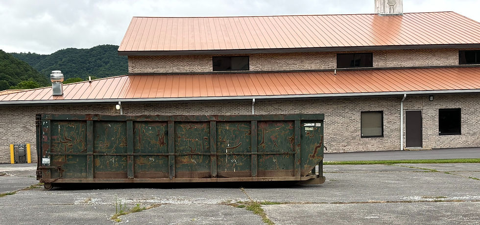 Dumpster at 501 Stokes Drive - (old Long John Silvers lot beside Lifeline Church)