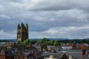 A landscape of rooftops, hills and a church..jpg
