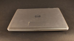 Item # 77,  DELL LATITUDE LAPTOP,